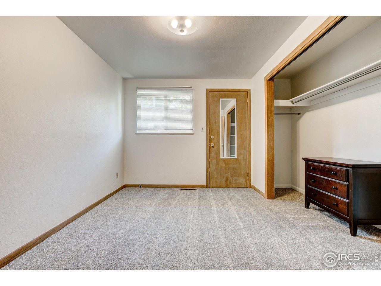 620 West Myrtle Street Fort Collins, CO 80521 - Photo 23 of 30 a view of an empty room with a window