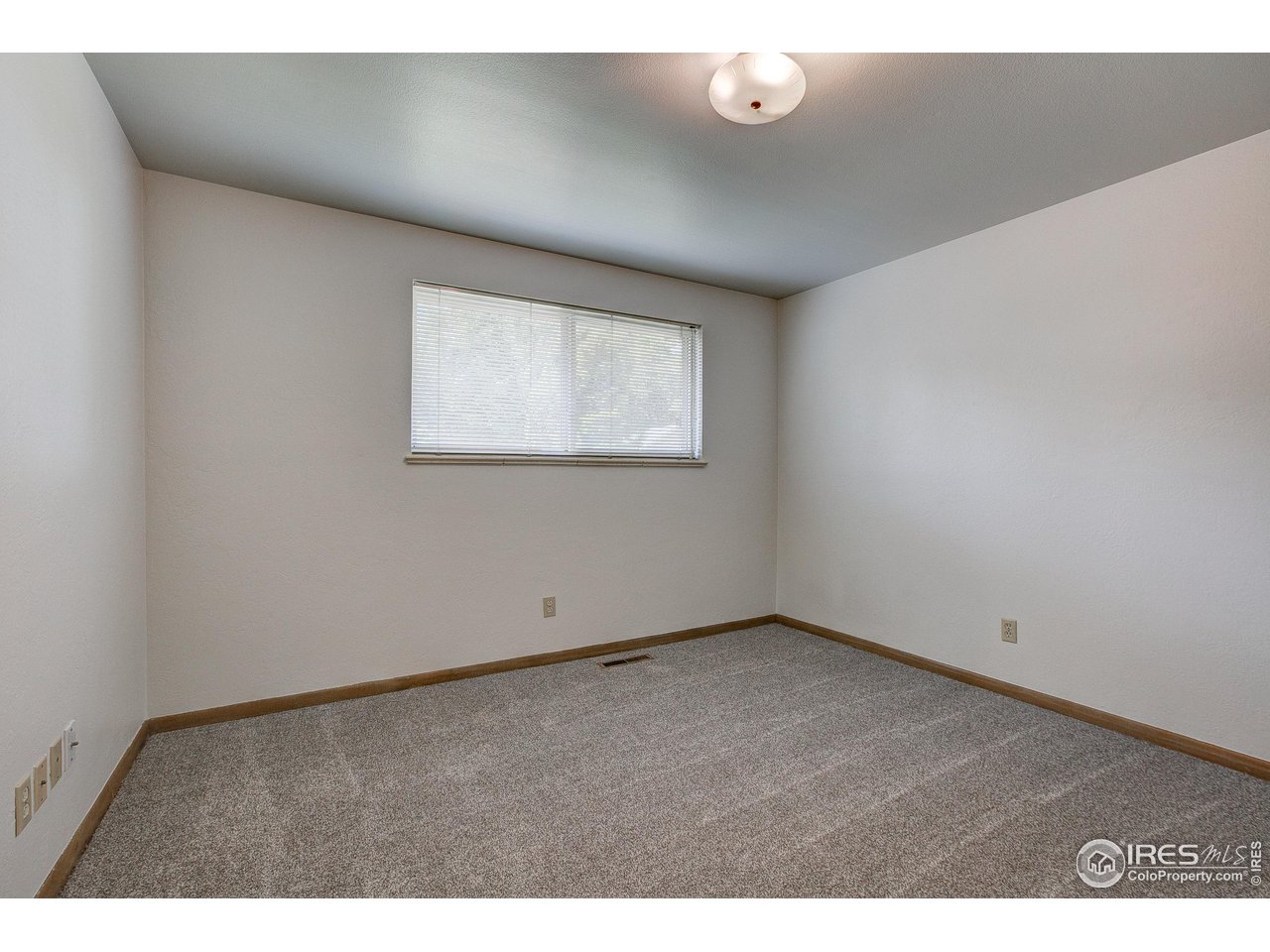 620 West Myrtle Street Fort Collins, CO 80521 - Photo 26 of 30 an empty room with windows