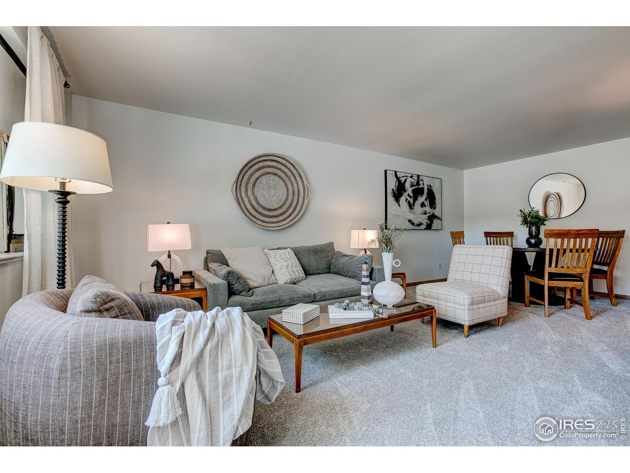 620 West Myrtle Street Fort Collins, CO 80521 - Photo 7 of 30 a living room with furniture and a lamp