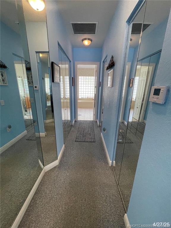 4513 Southwest 185th Avenue Miramar, FL 33029 - Photo 42 of 66 a view of a hallway with windows