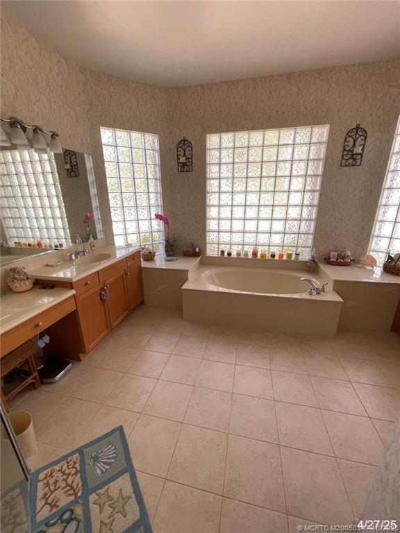 4513 Southwest 185th Avenue Miramar, FL 33029 - Photo 43 of 66 a living room with a couch and a window