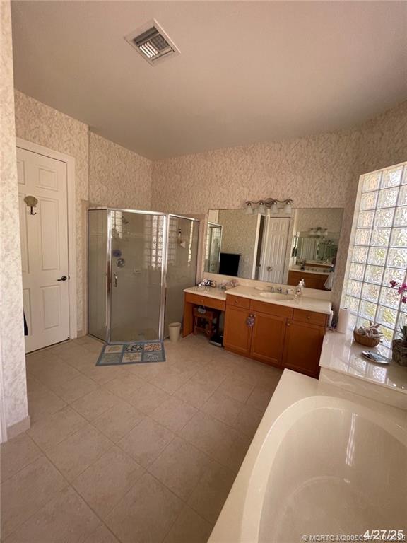 4513 Southwest 185th Avenue Miramar, FL 33029 - Photo 45 of 66 a room with furniture and a flat screen tv