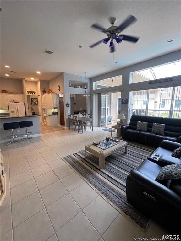 4513 Southwest 185th Avenue Miramar, FL 33029 - Photo 58 of 66 a living room with furniture and kitchen view