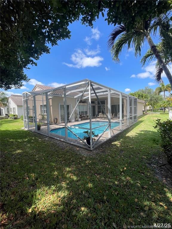 4513 Southwest 185th Avenue Miramar, FL 33029 - Photo 6 of 66 a view of a house with a backyard