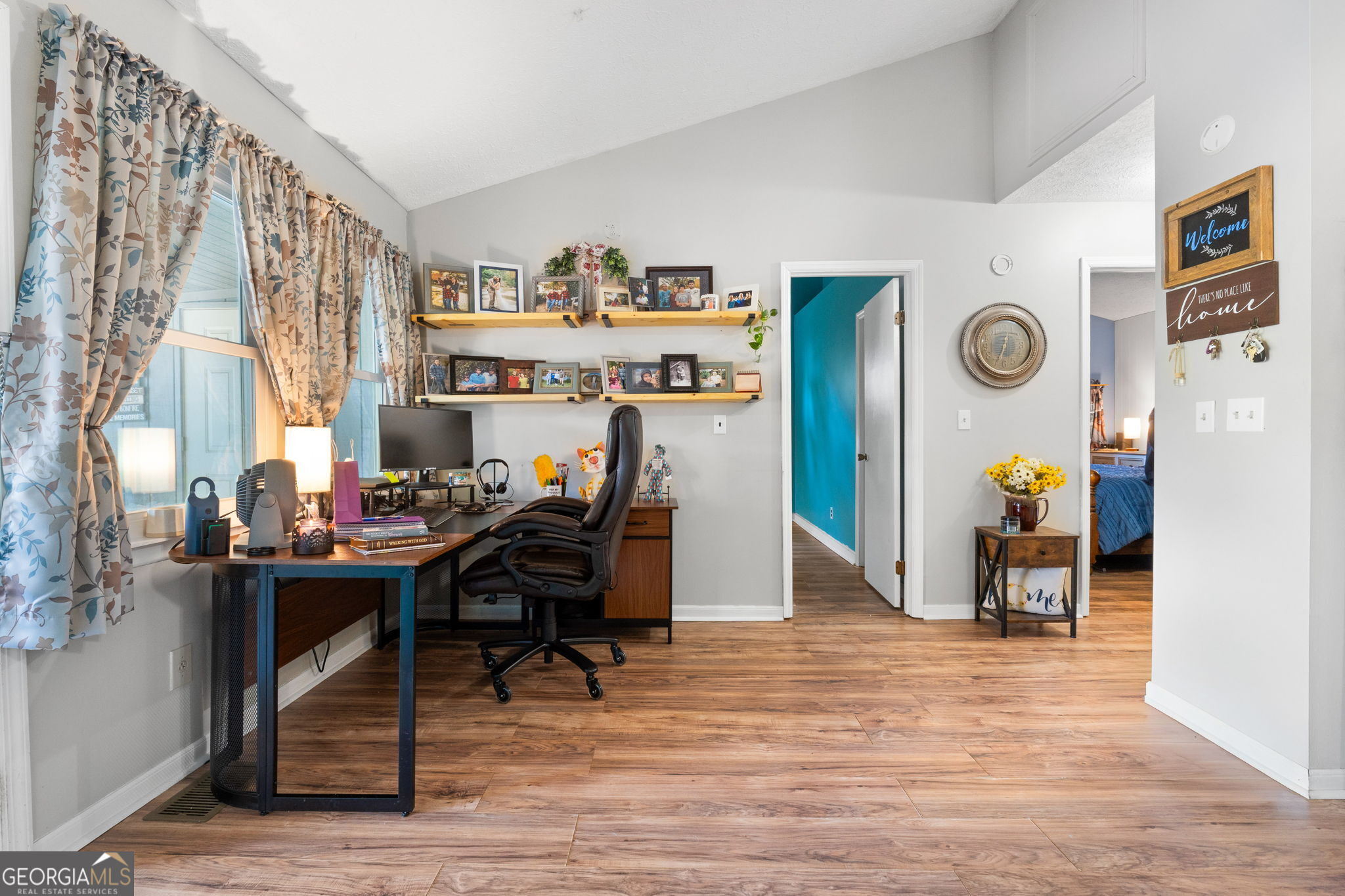 196 Horseshoe Bend Road Jackson, GA 30233 - Photo 11 of 21 a view of a workspace with furniture and a window