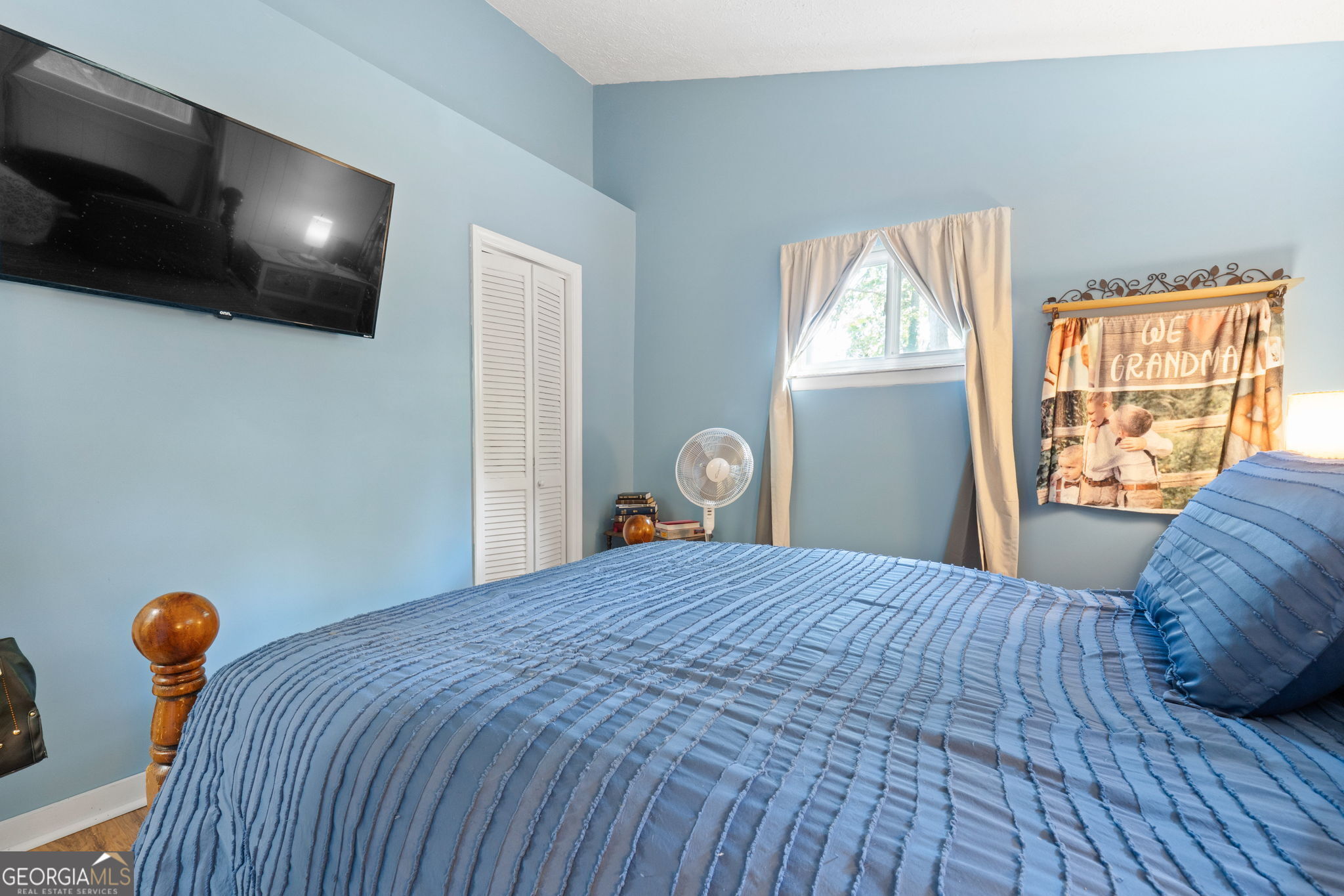 196 Horseshoe Bend Road Jackson, GA 30233 - Photo 12 of 21 a bedroom with a bed and a window