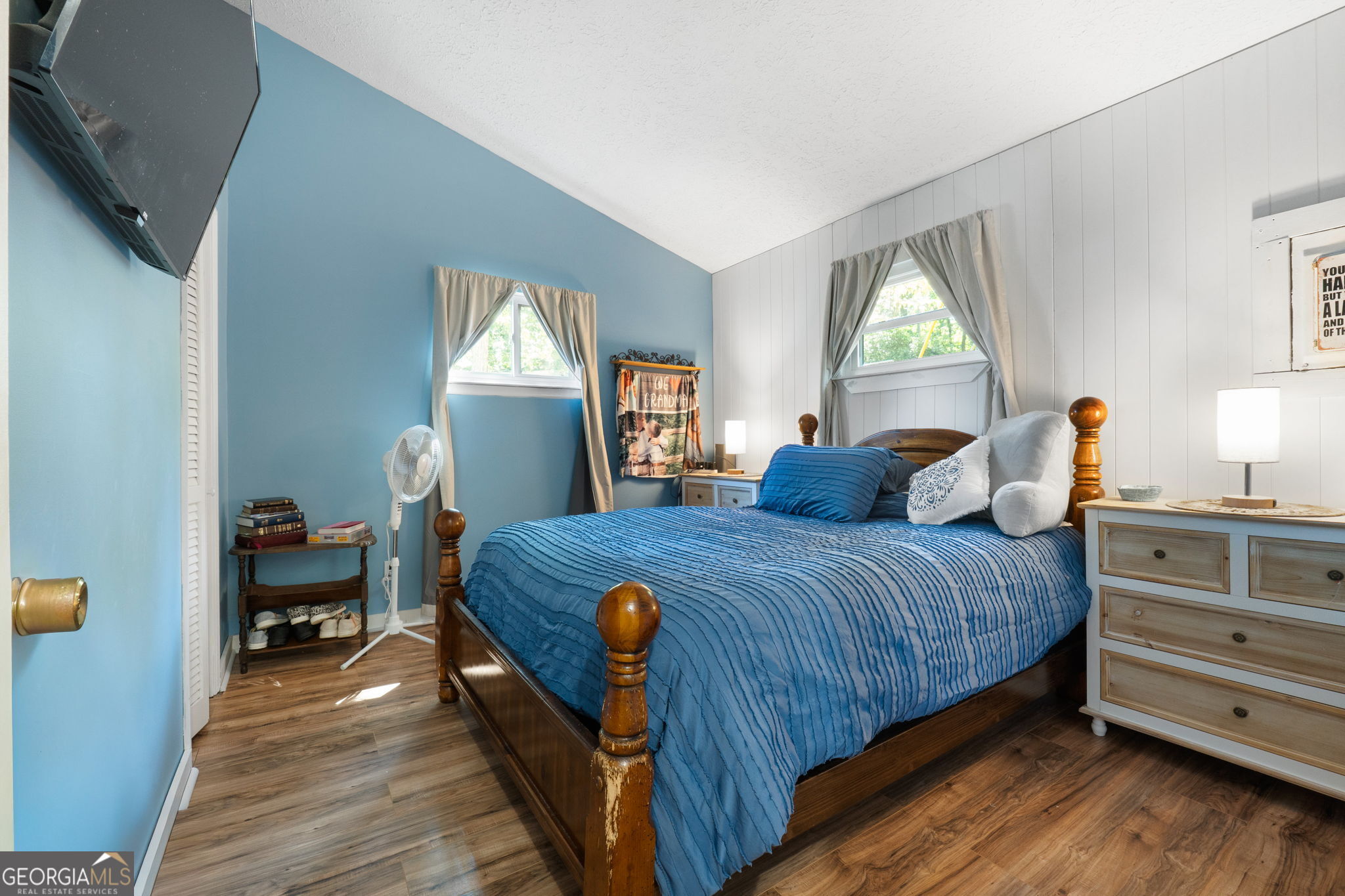 196 Horseshoe Bend Road Jackson, GA 30233 - Photo 13 of 21 a bedroom with a bed and a window