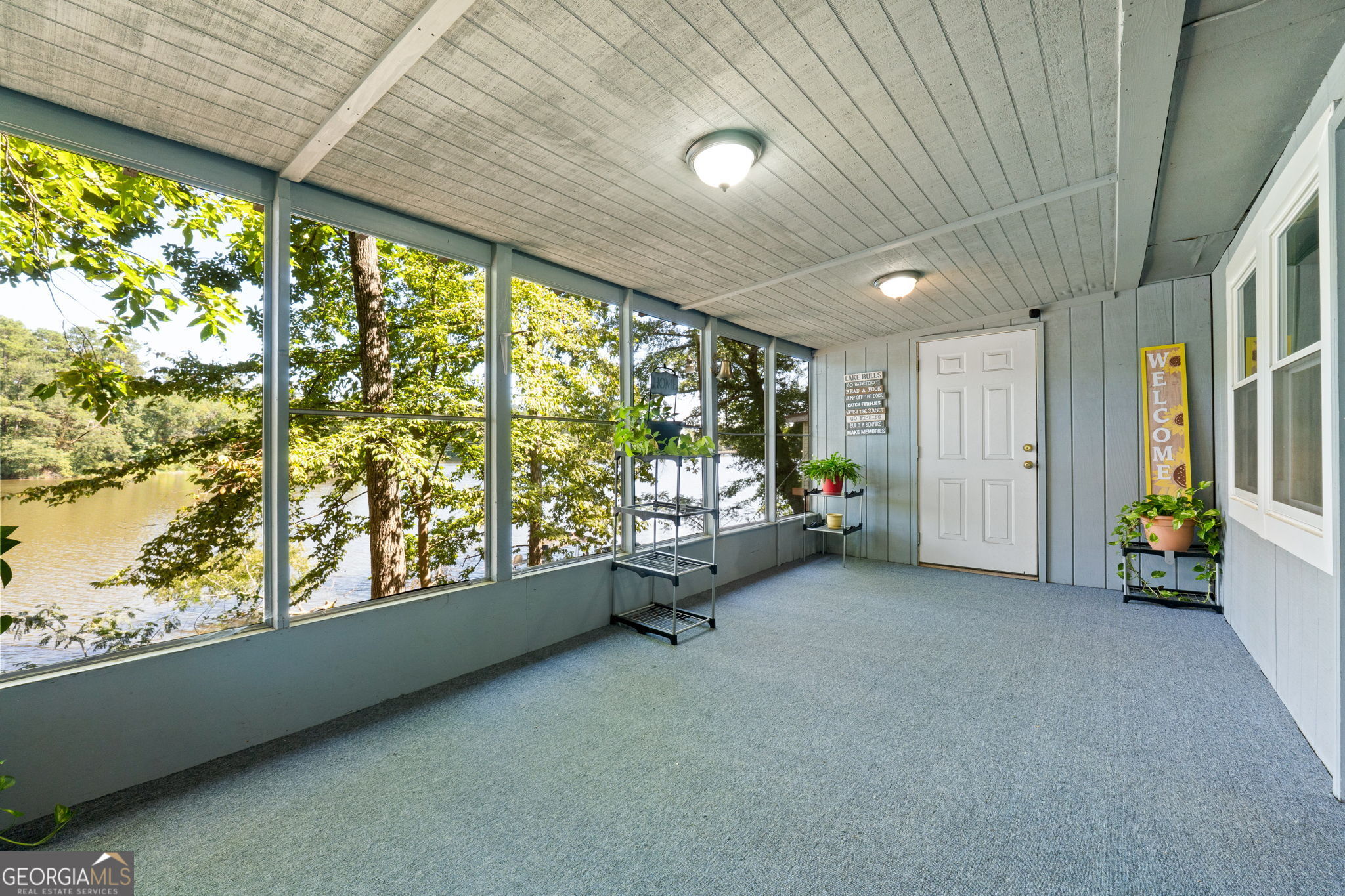 196 Horseshoe Bend Road Jackson, GA 30233 - Photo 17 of 21 a view of an empty room with a large window