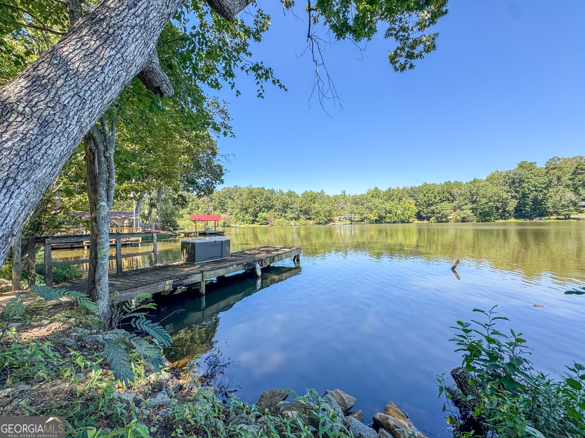 196 Horseshoe Bend Road Jackson, GA 30233 - Photo 20 of 21 an outdoor sitting area with lake view