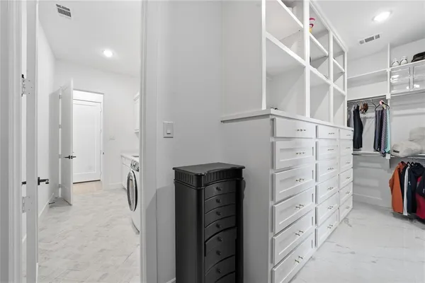 view of walk in closet with closet