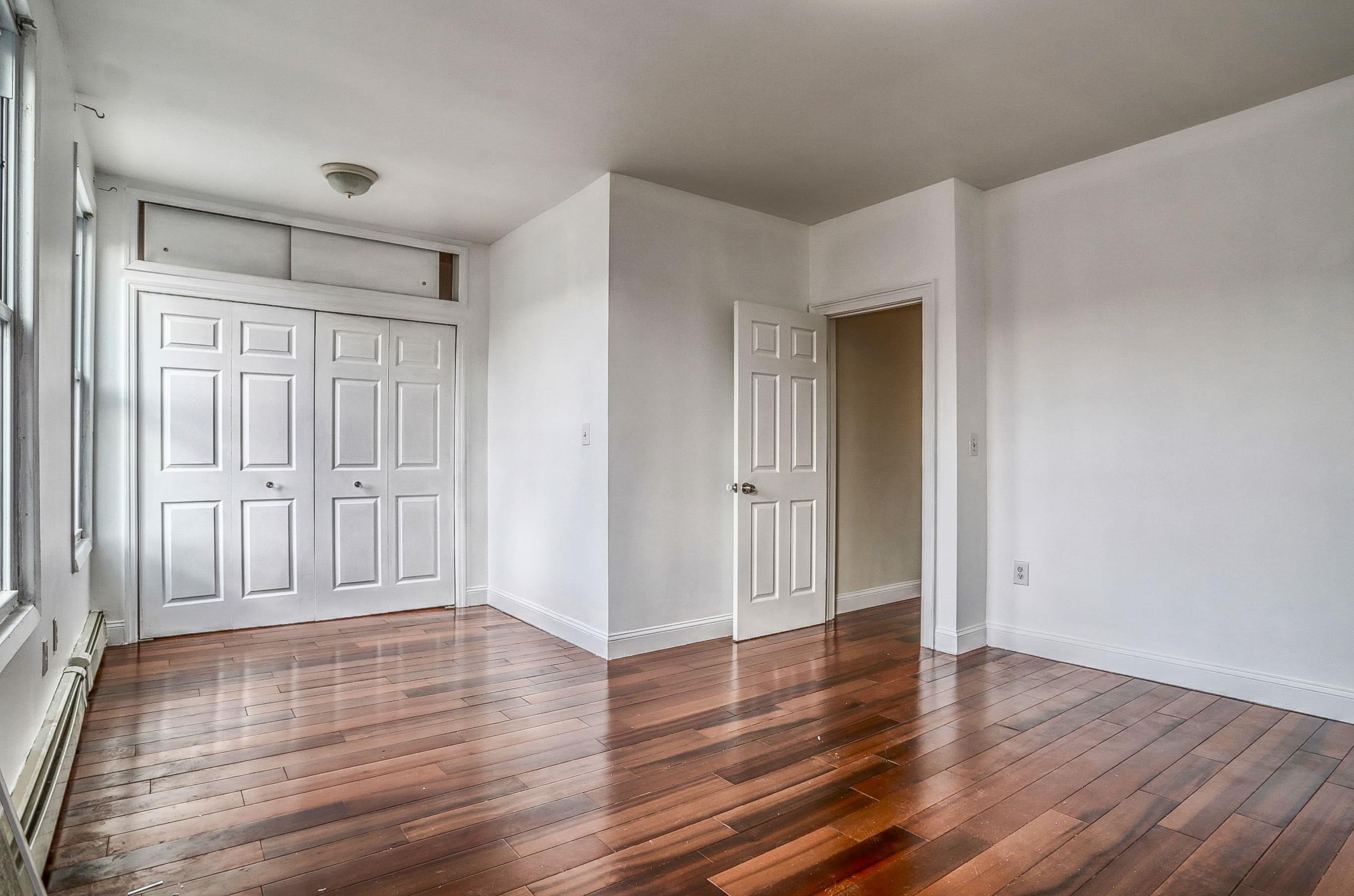 206 Dodd Street, Unit 2 Weehawken, NJ 07086 - Photo 14 of 20 a view of empty room with wooden floor