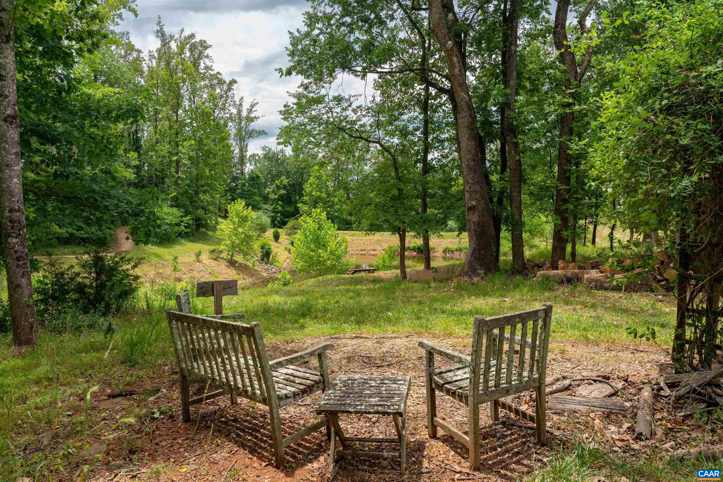 2246 Hyland Ridge Drive Charlottesville, VA 22911 - Photo 45 of 53 a view of a chair and table on the garden