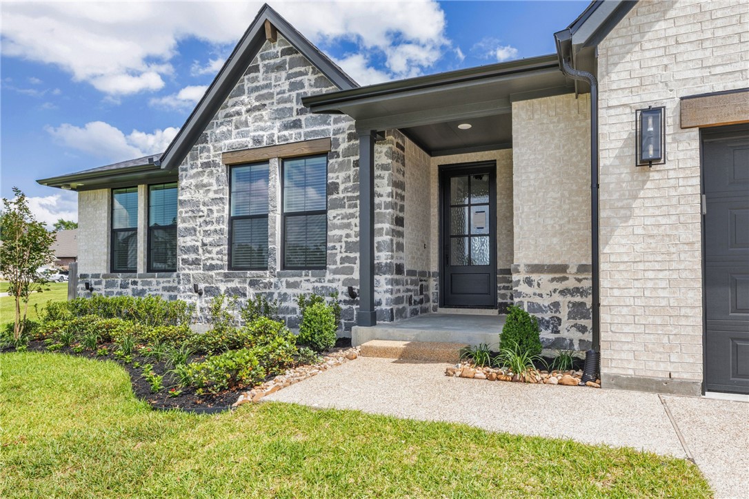 3565 Chantilly Path Bryan, TX 77808 - Photo 2 of 28 Front of home at entryway