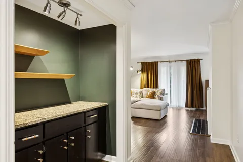 a bedroom with a bed and a mirror