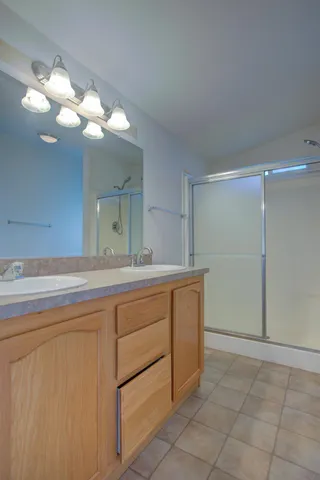 a view of a storage & utility room with a sink
