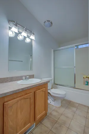 a view of hallway with wooden floor