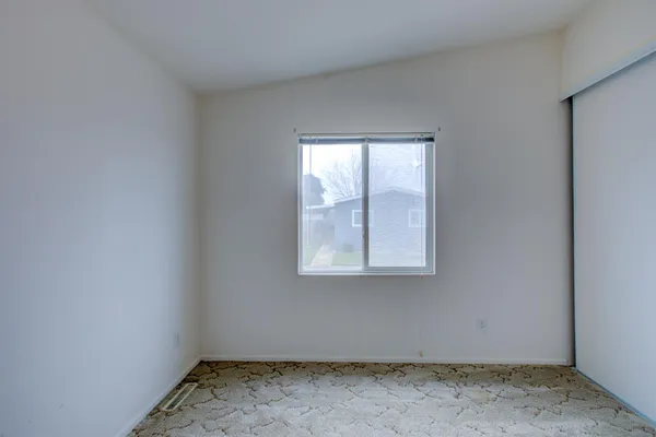 an empty room with a window