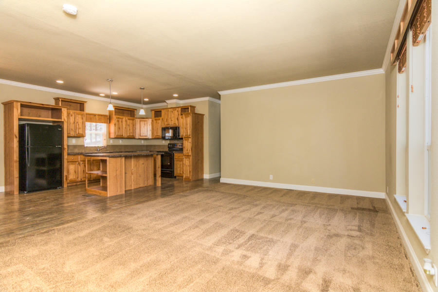 56264 Black Duck Road Bend, OR 97707 - Photo 3 of 31 The main living area is large and separates the Master Suite from the Guest Rooms.