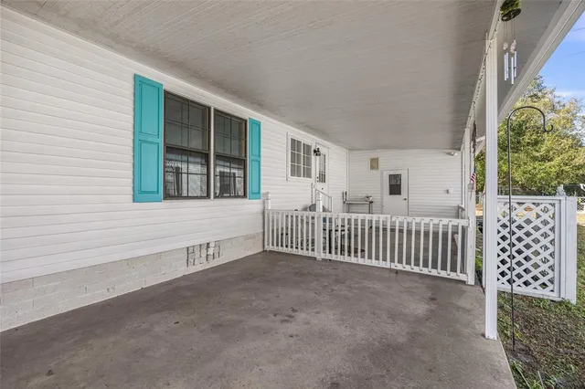 a view of porch with wooden floor and fence