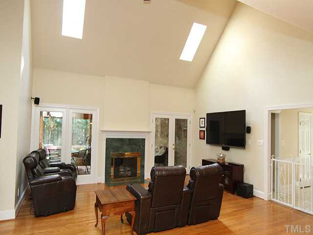 2504 Barton Ridge Court Raleigh, NC 27613 - Photo 24 of 25 The open floor plan & the stairway bridge along the 2nd floor emphasizes the large rooms. Den/Family/Great Room