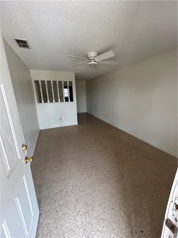 512 Gastel Circle, Unit 5 Edinburg, TX 78539 - Photo 2 of 10 an empty room with windows