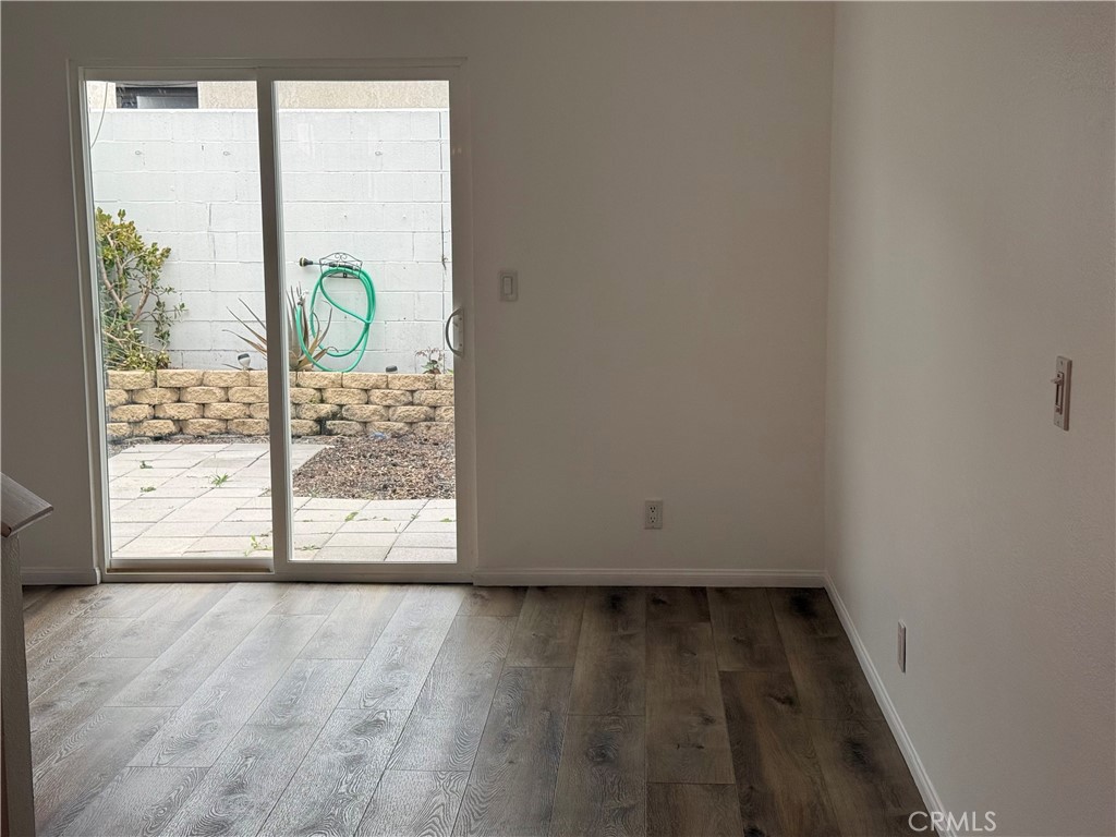 950 West Lambert Road, Unit 11 La Habra, CA 90631 - Photo 17 of 32 Living space with access to the backyard