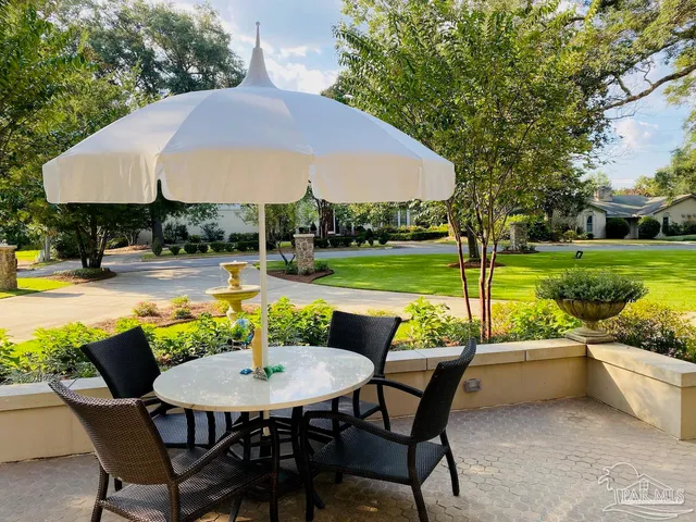 a view of entryway with wooden floor and stairs