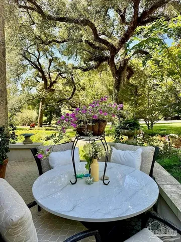 a view of a fireplace with wooden floor