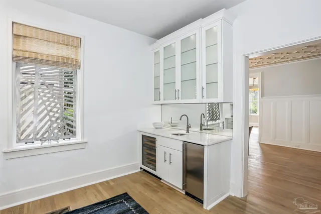 a bathroom with a bathtub and a sink