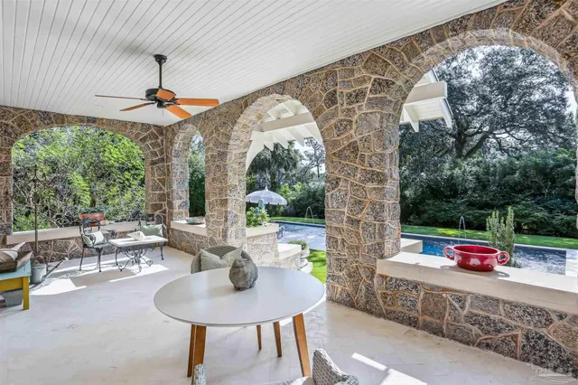 a view of a hallway with windows