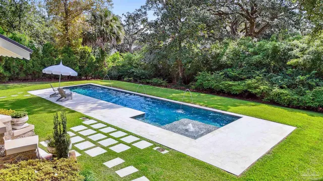 a view of a house with a garden