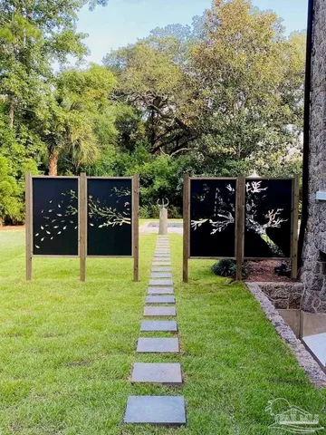 a bathroom with a sink a mirror and a shower