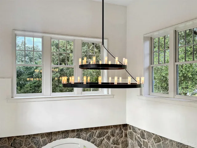a kitchen with granite countertop a stove and a sink