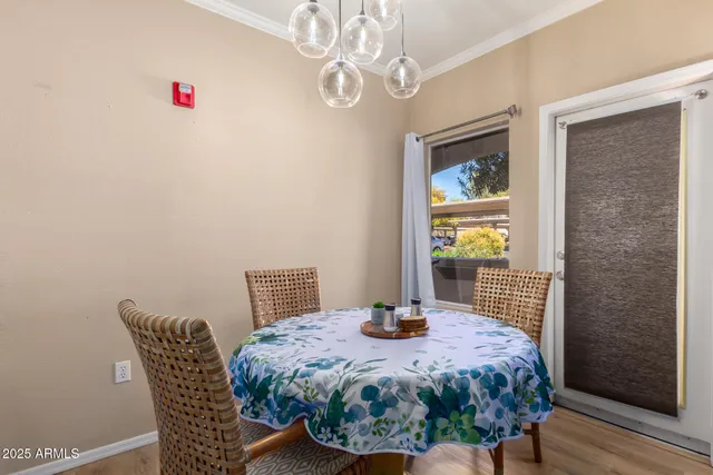 a bedroom with a bed and a table