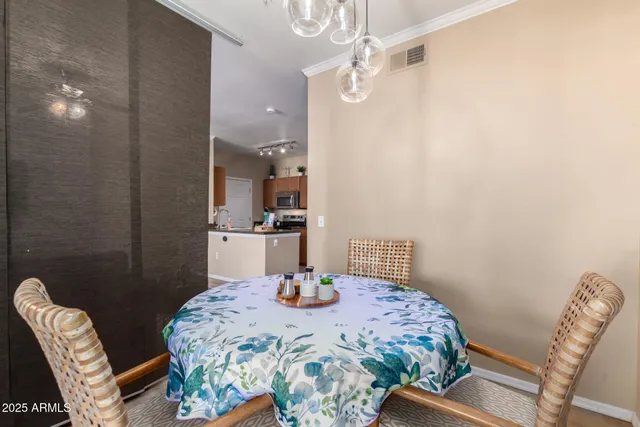 a view of a dining room with furniture