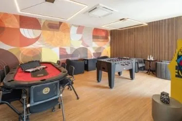 a bedroom with furniture and a window