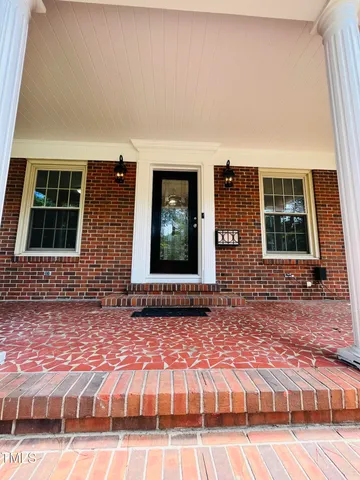 a view of backyard with green space