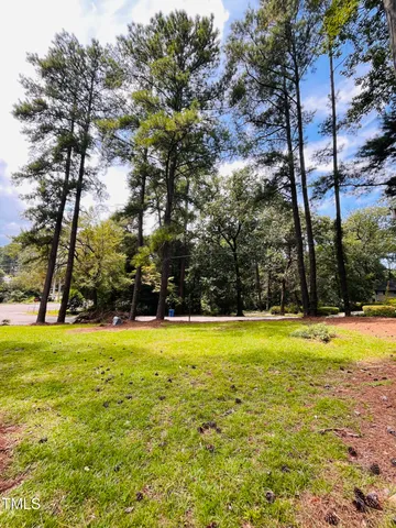 a picture of a bathroom with a shower