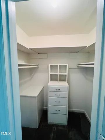 a bathroom with a tub and a shower