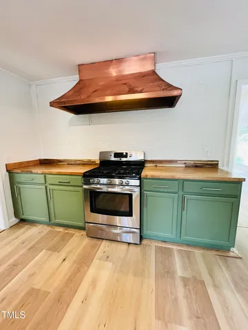 a room with a bed and furniture