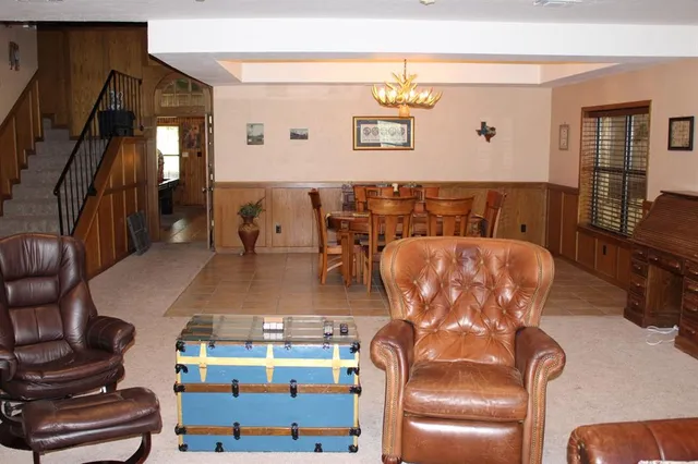 a view of a living room with furniture