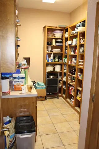 a kitchen with stainless steel appliances a stove and a refrigerator