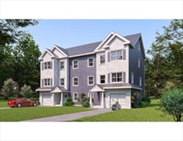 249 Groton Road, Unit 2 Chelmsford, MA 01863 - Photo 1 of 23 a front view of a house with a yard