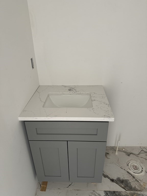 249 Groton Road, Unit 2 Chelmsford, MA 01863 - Photo 11 of 23 a bathroom with a sink and vanity