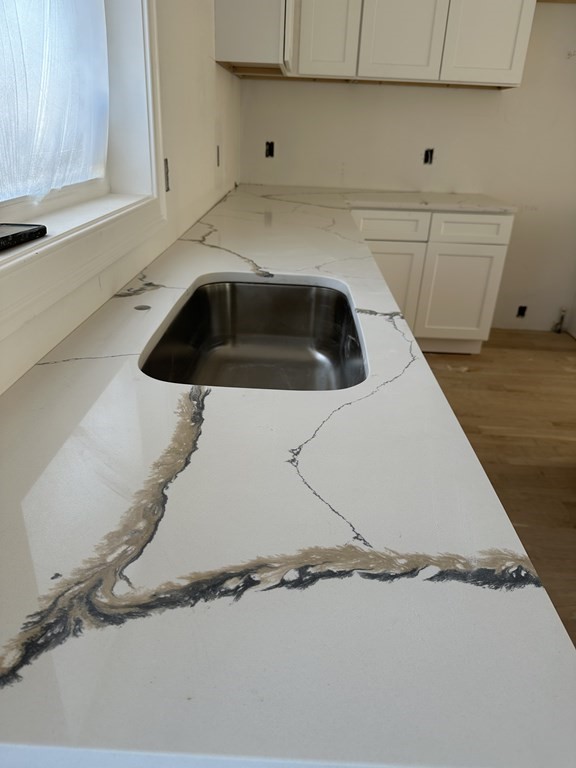 249 Groton Road, Unit 2 Chelmsford, MA 01863 - Photo 14 of 23 a utility room with a sink