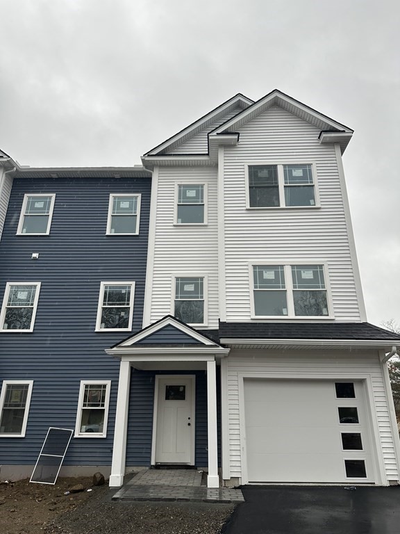 249 Groton Road, Unit 2 Chelmsford, MA 01863 - Photo 19 of 23 a front view of a house