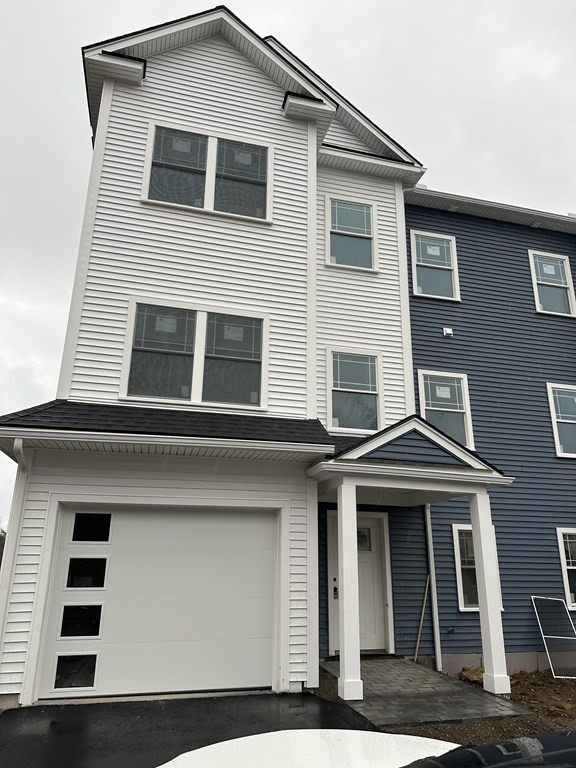 249 Groton Road, Unit 2 Chelmsford, MA 01863 - Photo 23 of 23 a front view of residential houses