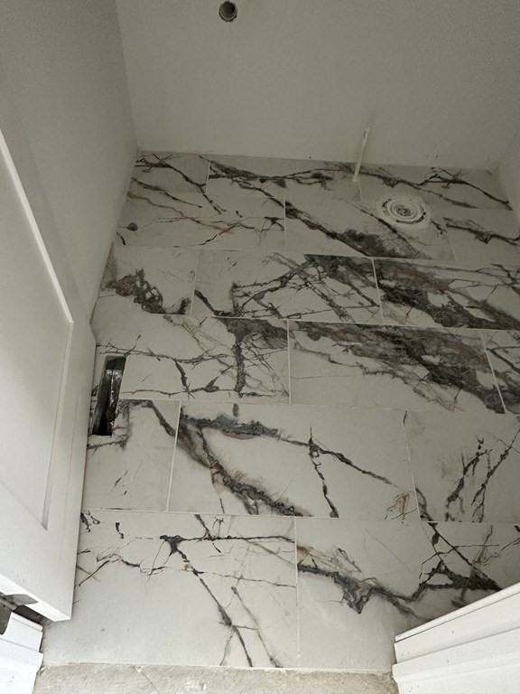 249 Groton Road, Unit 2 Chelmsford, MA 01863 - Photo 6 of 23 a bathroom with a bathtub