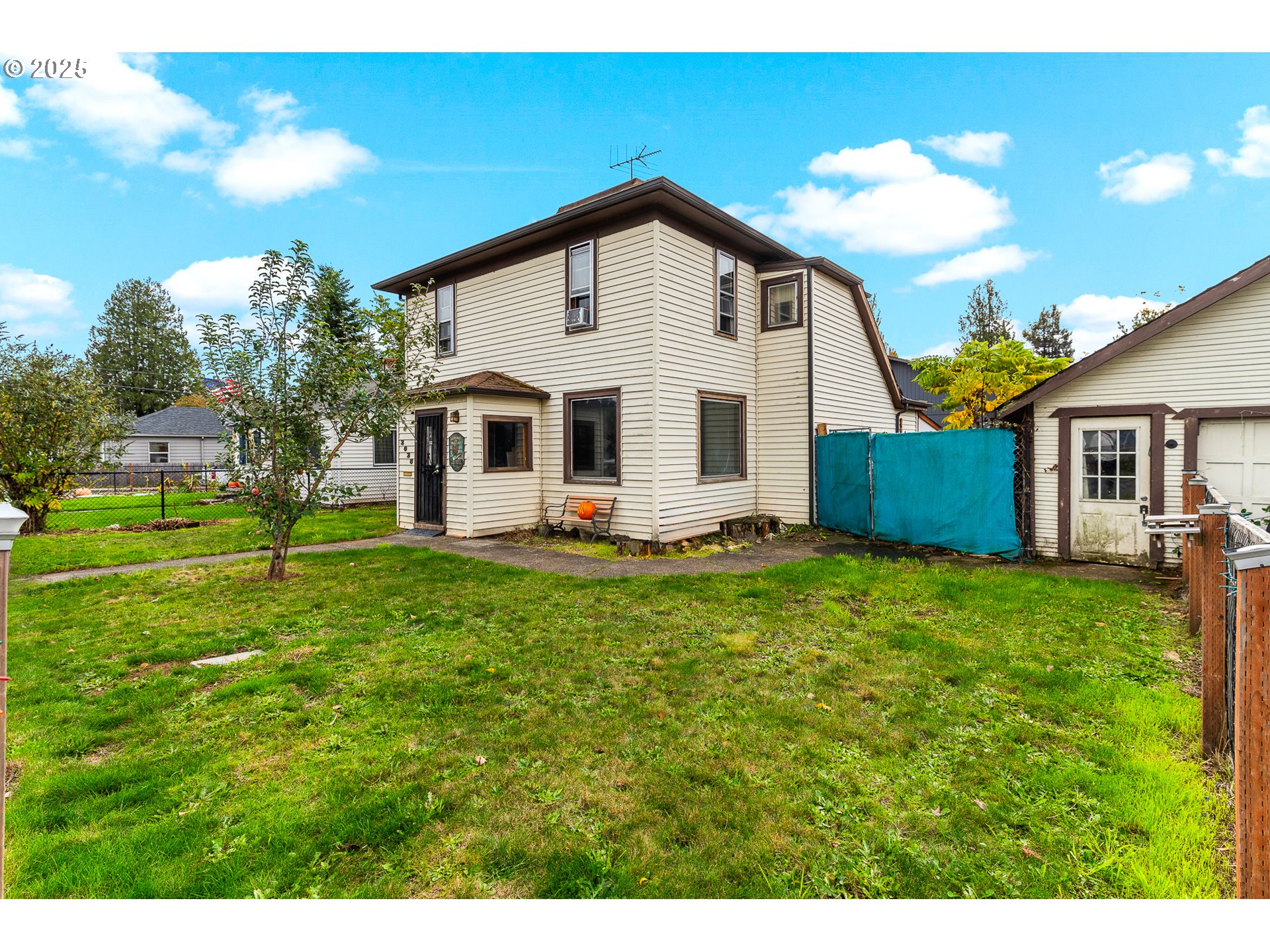 2026 C Street Washougal, WA 98671 - Photo 13 of 36 a front view of a house with a yard