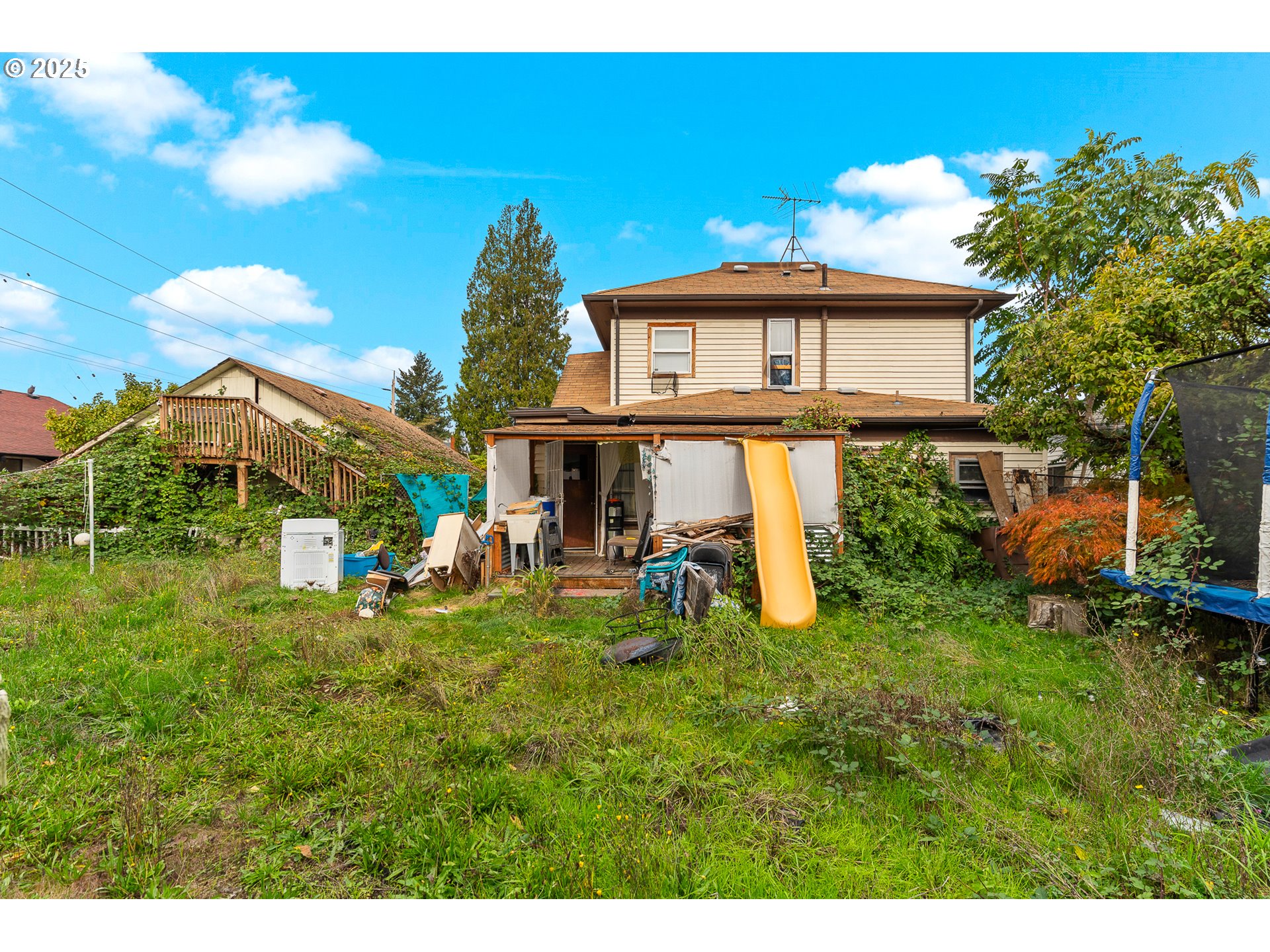 2026 C Street Washougal, WA 98671 - Photo 17 of 36 a front view of a house with garden